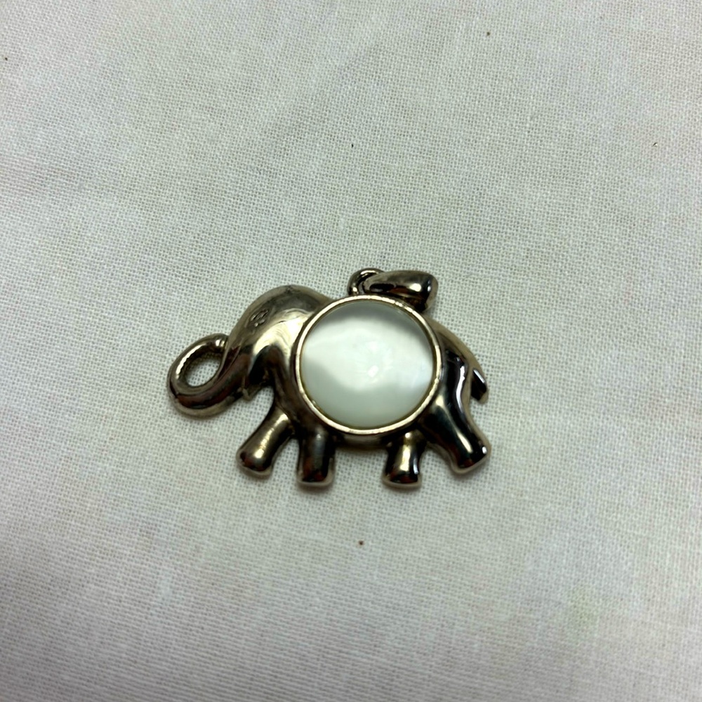 Beautiful Pearl like stone in Silver colored elephant